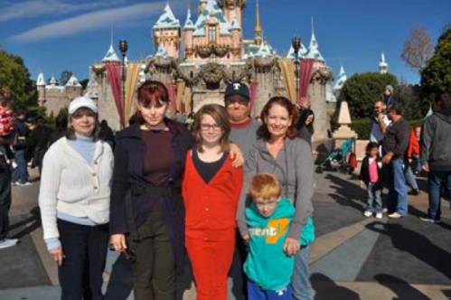 Our family in front of Sleeping Beauty's Castle